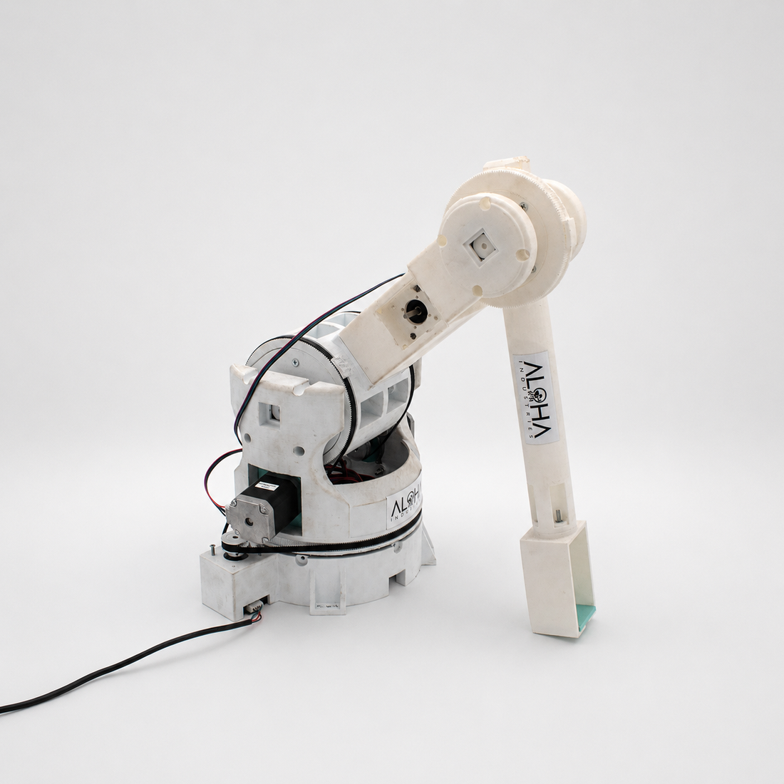 Multi-axis robotic manipulator on a light studio background