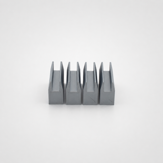 Four lightweight U-profile guides on a light studio background
