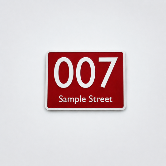 Custom red and white 3D-printed house number sign