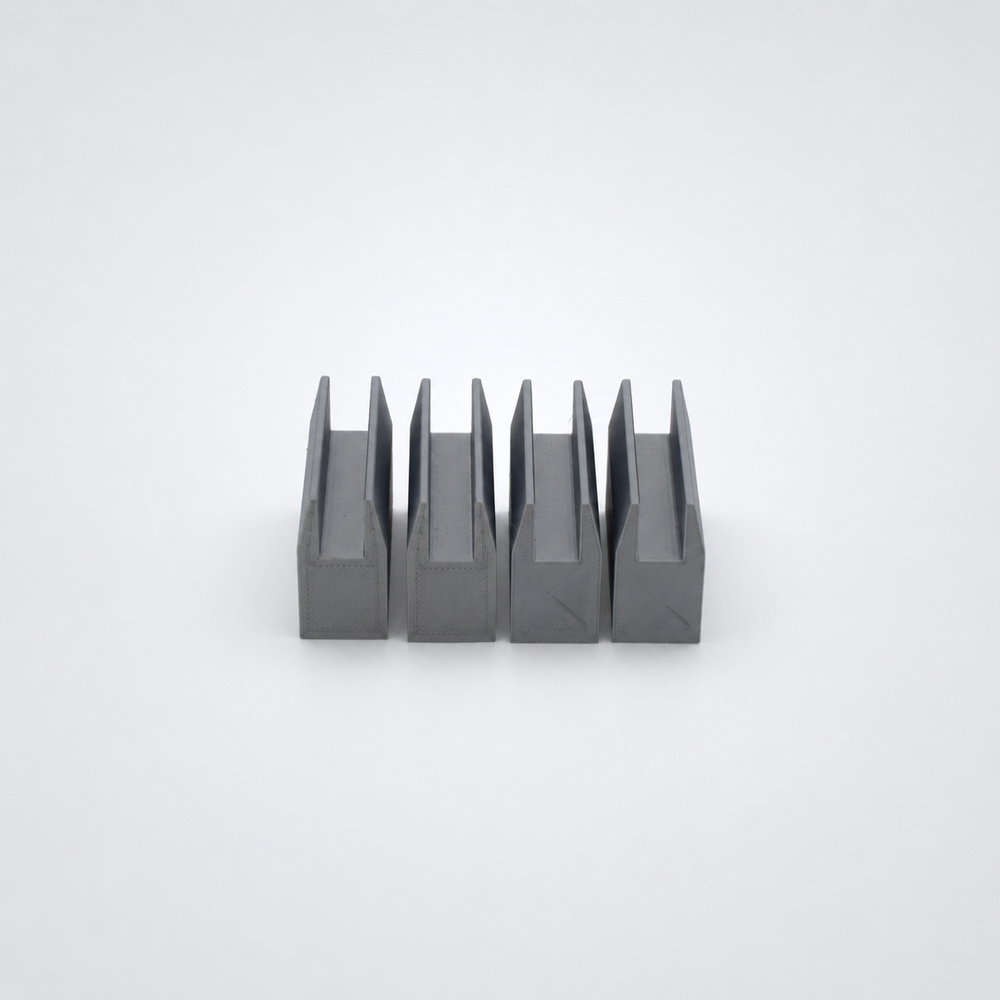 Custom grey 3D-printed plastic parts