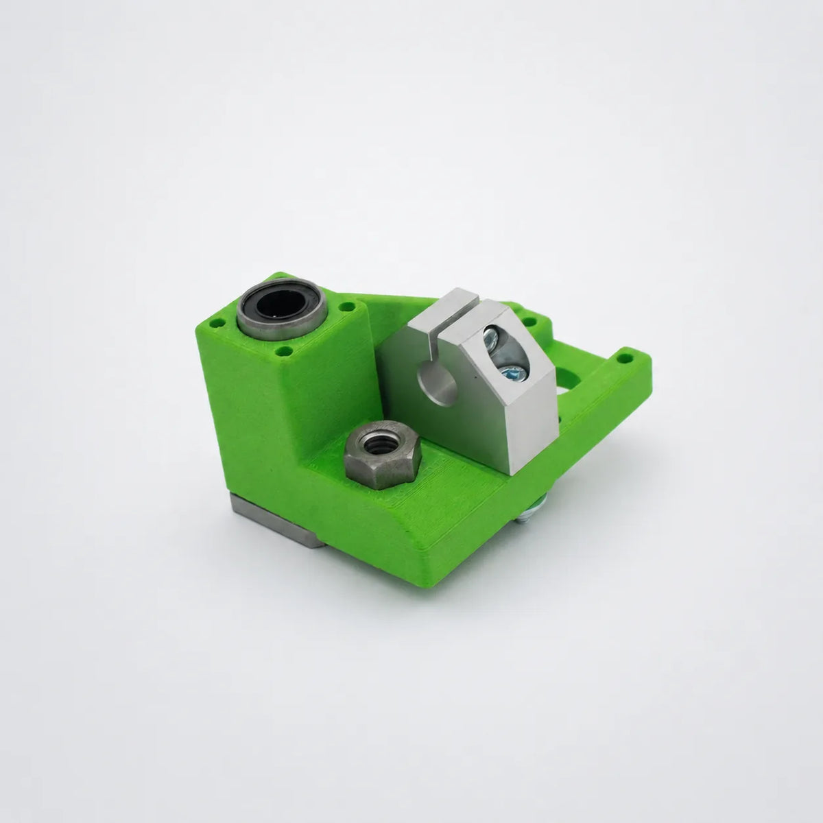 Green 3D-printed part assembled with bearing and hardware