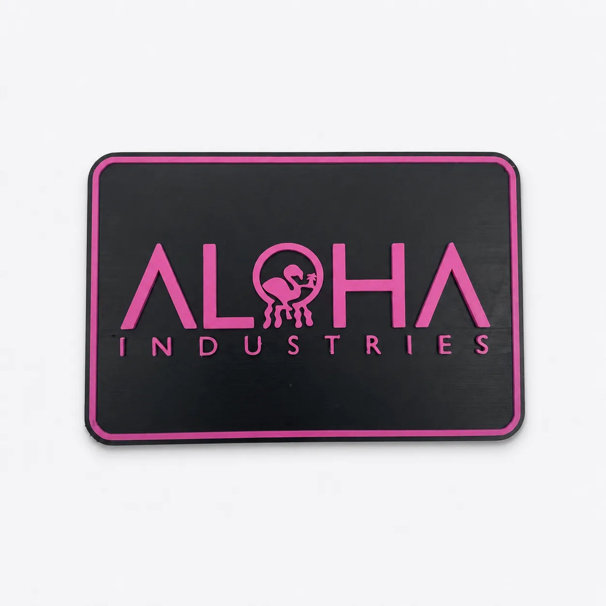 Custom 3D-printed sign with pink Aloha Industries logo on black