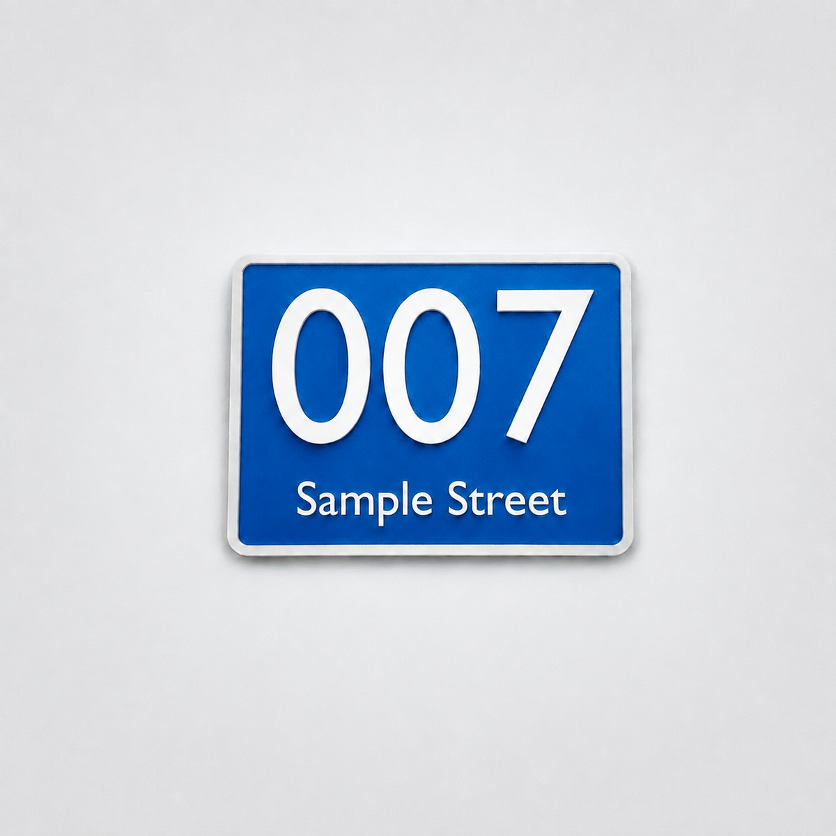 Blue custom house number sign with white text