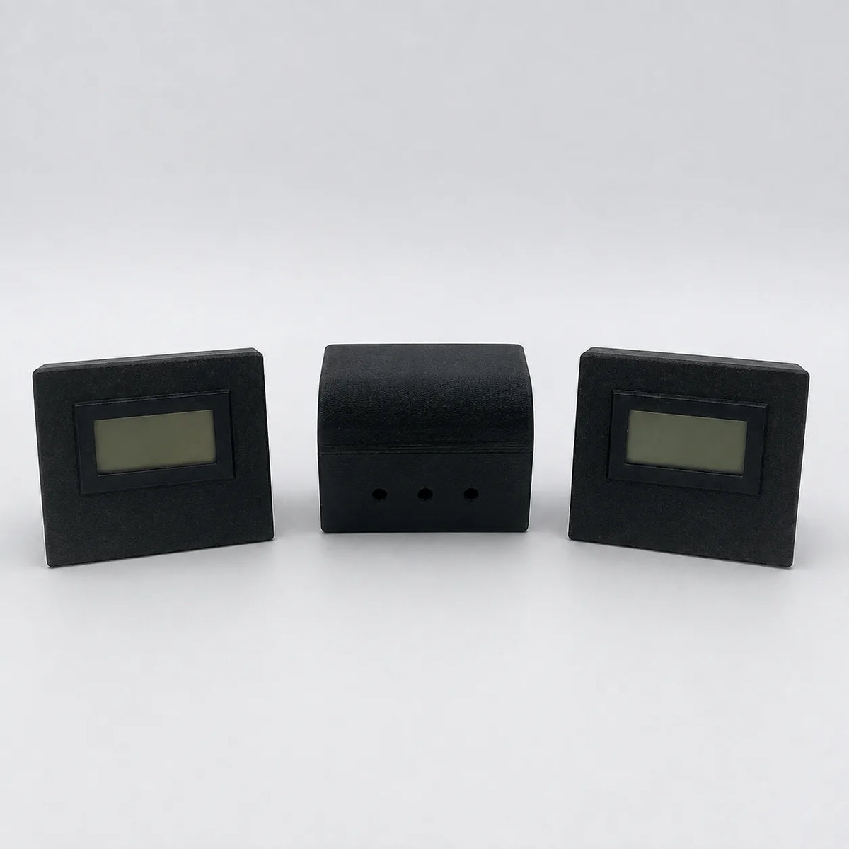 Black digital temperature and humidity sensor, rear view