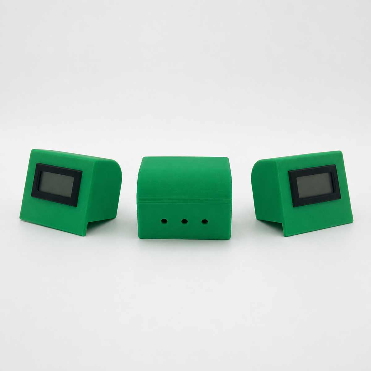 Green temperature and humidity sensor showing front and ventilated rear views