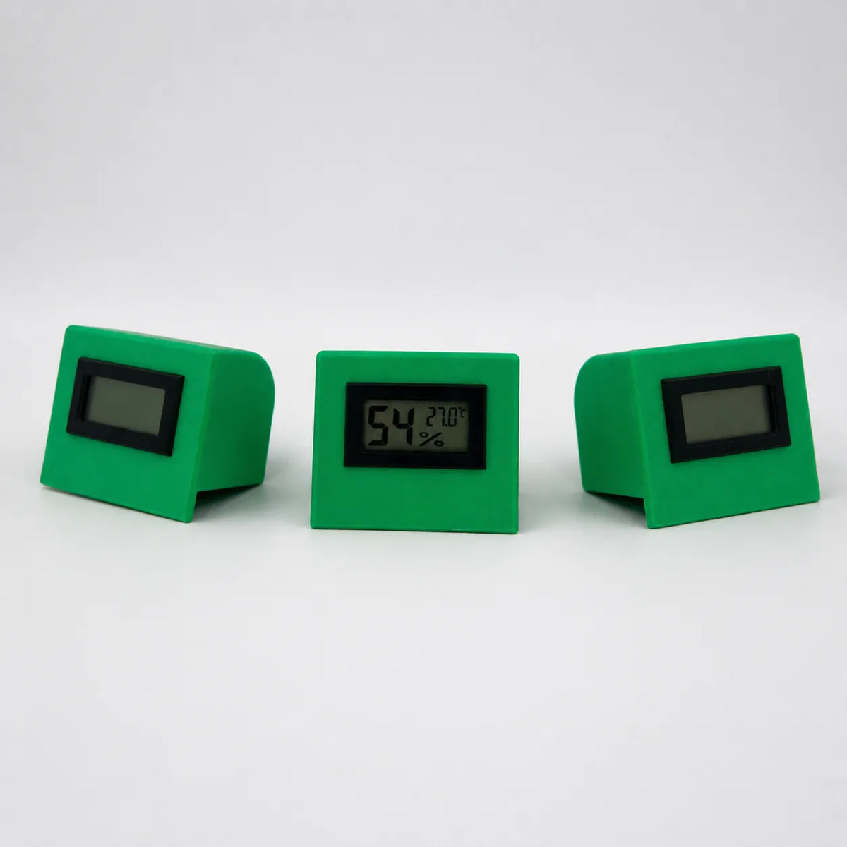 Green digital temperature and humidity sensor, three views