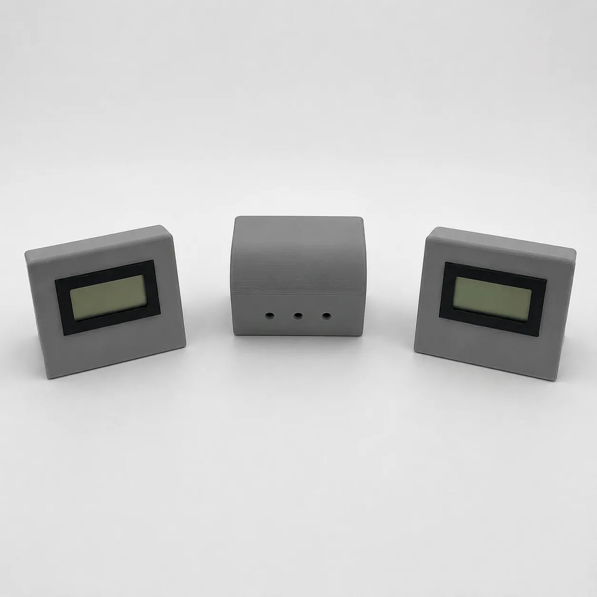 Grey digital temperature and humidity sensor, rear view