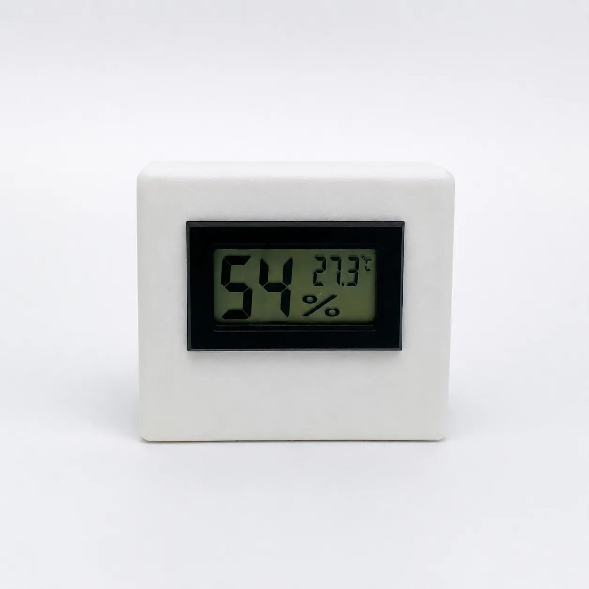White digital temperature and humidity sensor, front view