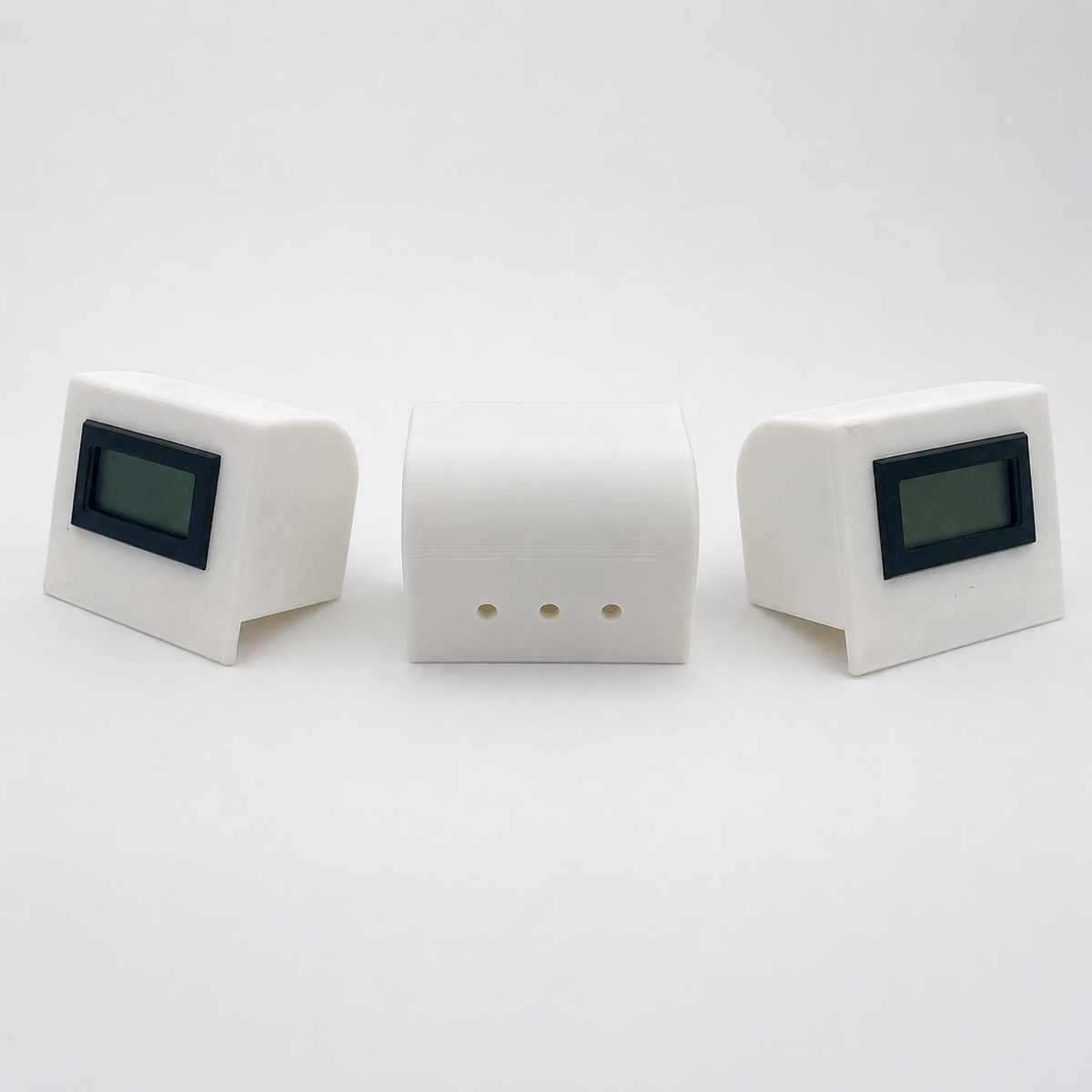 White temperature and humidity sensor showing front and ventilated rear views