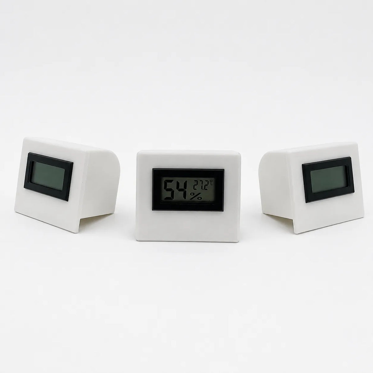 White digital temperature and humidity sensor, three views